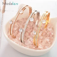 

Modalen Stainless Steel Plain Simple Crystal Pave Quartz Gold Design Metal Custom Bangle