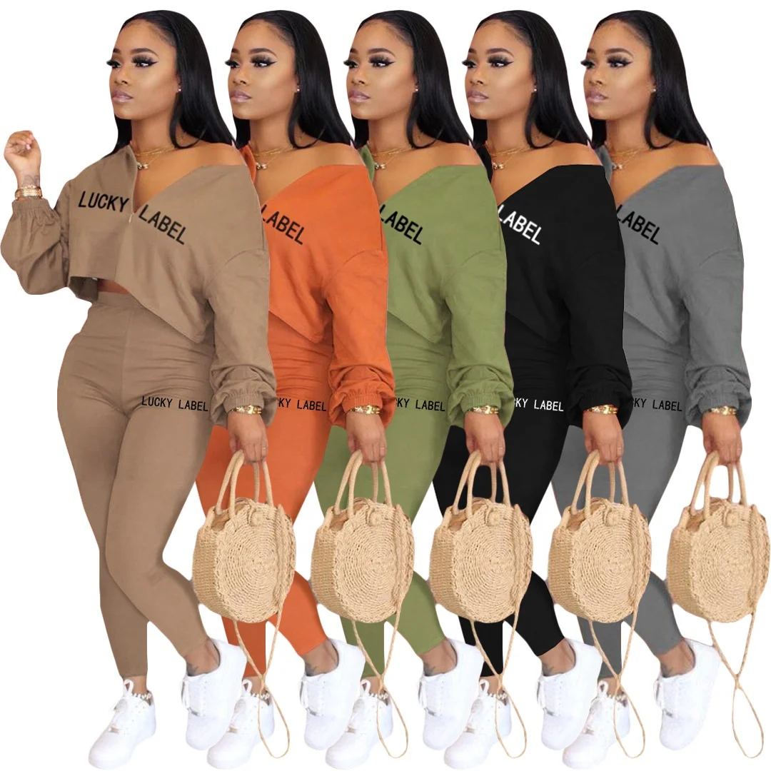 

Custom Logo Women Casual Lucky Label Embroidered Long Sleeve Loose Crop Top Skinny Leggings Tracksuit 2 Piece Matching Set