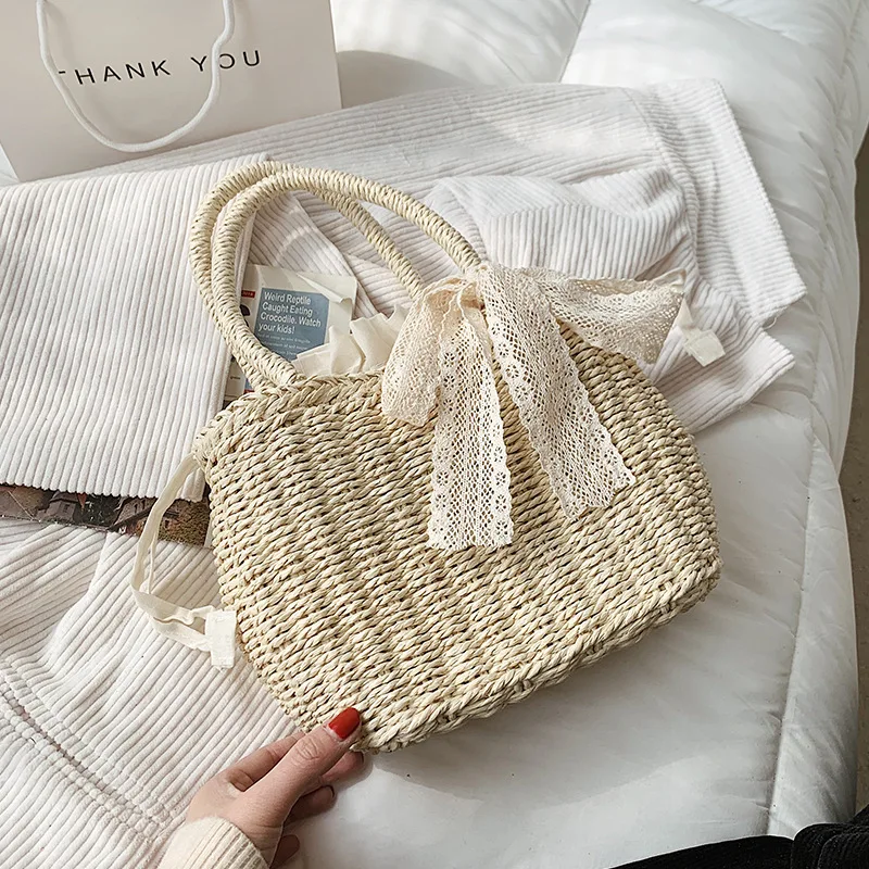 

2021 Wholesale low price beach bag water hyacinth handbag straw tote bag rattan bag, 2 colors
