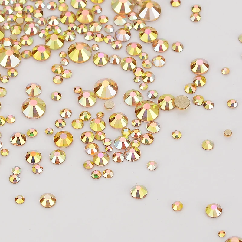 

Wholesale Gold Sunlight color Non HotFix Glass FlatBack Rhinestones Mix size SS3-SS20 for Garments and Art Decoration