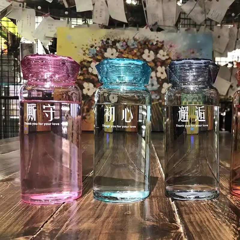 

Crystal Infused Gem Water Bottle Wellness 500ml Glass water bottle wholesale Coloured stone glass water bottle, 4 colors