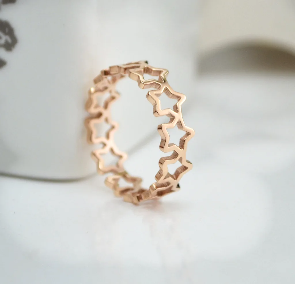 

Stainless Steel Fashion Rose Gold Five-pointed Star Hollow Ring Exquisite Girl Ring