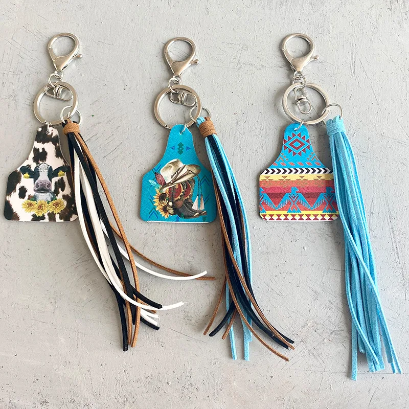 

Navajo style cow ear shape keyring serape cattle patterns with tassel tag key ring