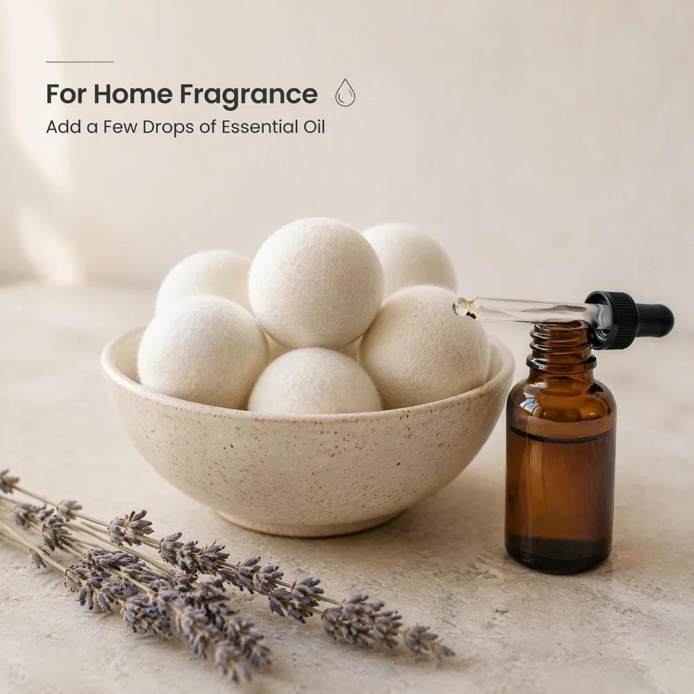 Wool dryer balls used for home fragrance with a few drops of essential oil from a dropper bottle