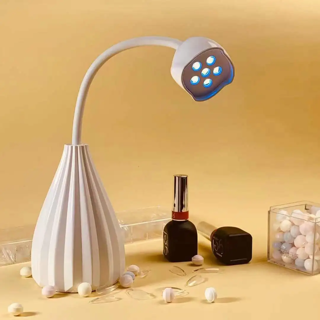 

2021 new wireless battery type led uv nail dryer polish glue lamp 12w white lotus phototherapy machine for nail salon
