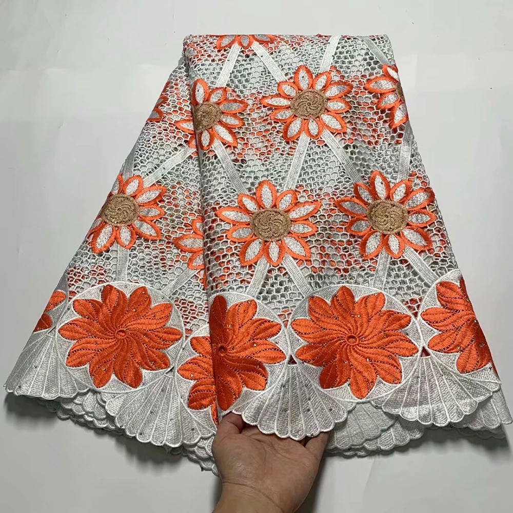 

Orange color new design guipure lace fabrics with stones beautiful French cord lace fabrics for women dress