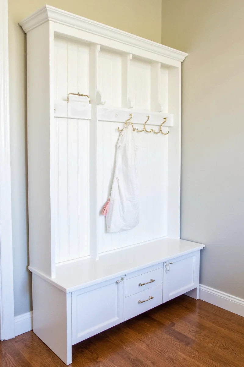 Before and after transformation of a mudroom pantry