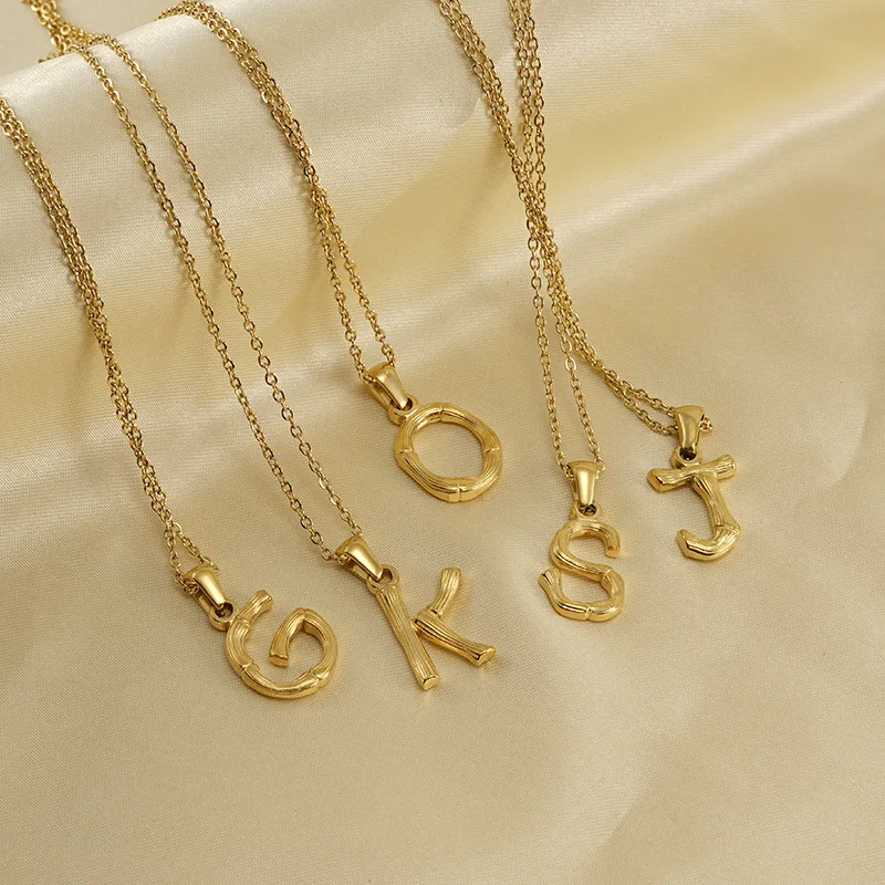 

2023 Hip-hop Texture Bamboo Letter Necklace Stainless Steel Plated 18k Gold Mini 26 Letter Initial Necklace For women