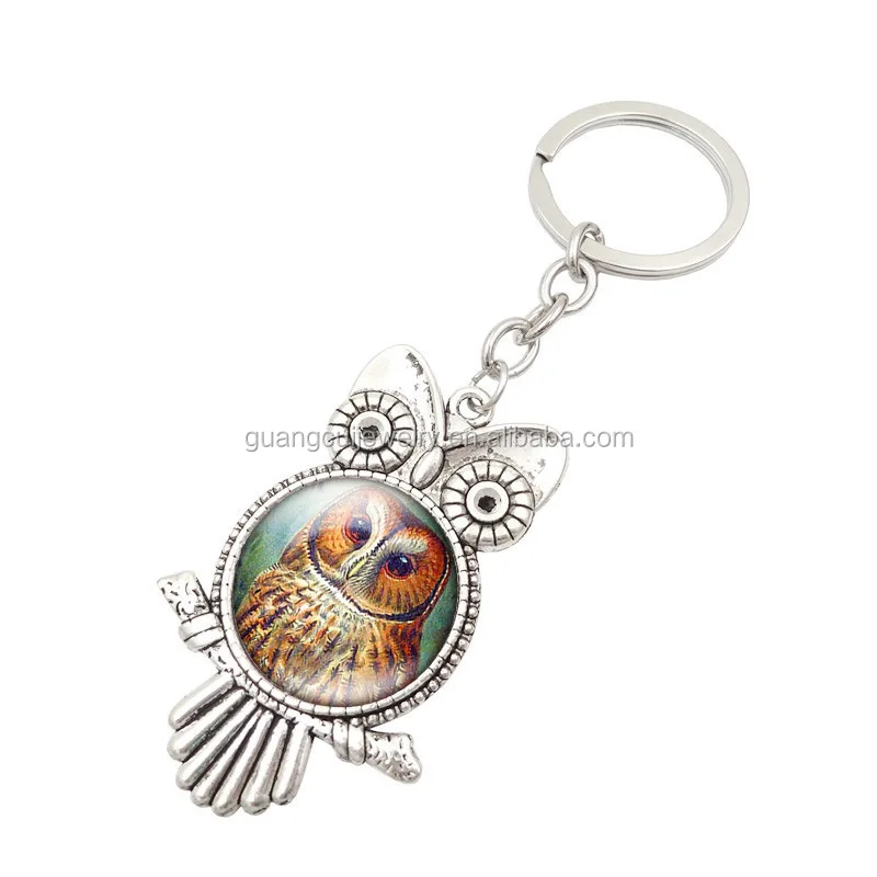 
GCK17-518 Yiwu Guangcui Wholesale custom metal owl shape crystal glass keychain 