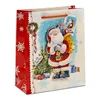 Wholesale traditional Santa carrying christmas gifts for happy new year glossy paper bag