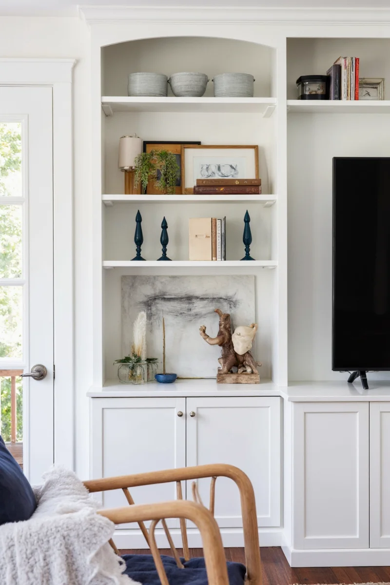 Colorful built-in cabinets with toys and books