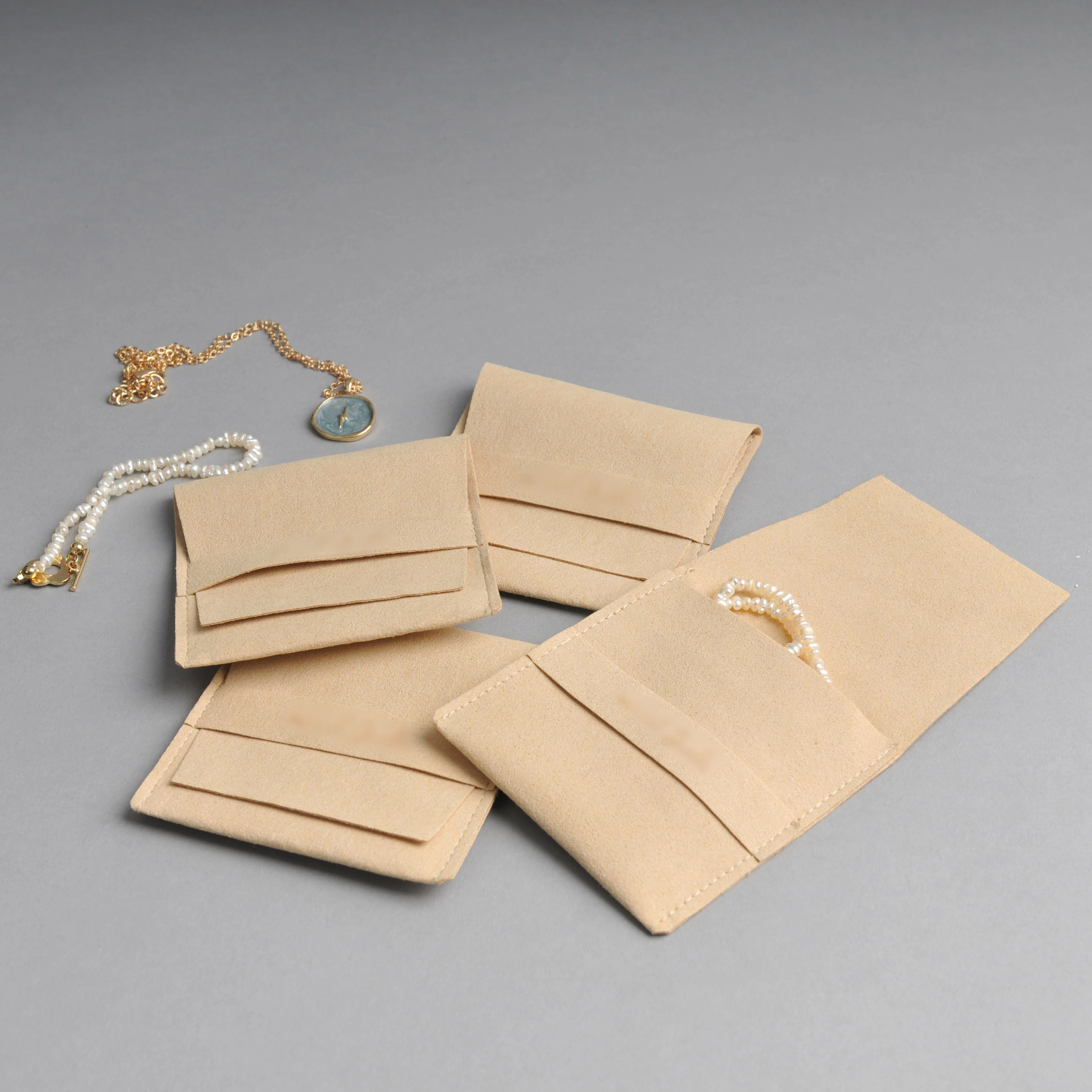 

Luxury envelope custom small suede printed jewelry packaging pouches bracelet leather earring jewelry pouch microfiber