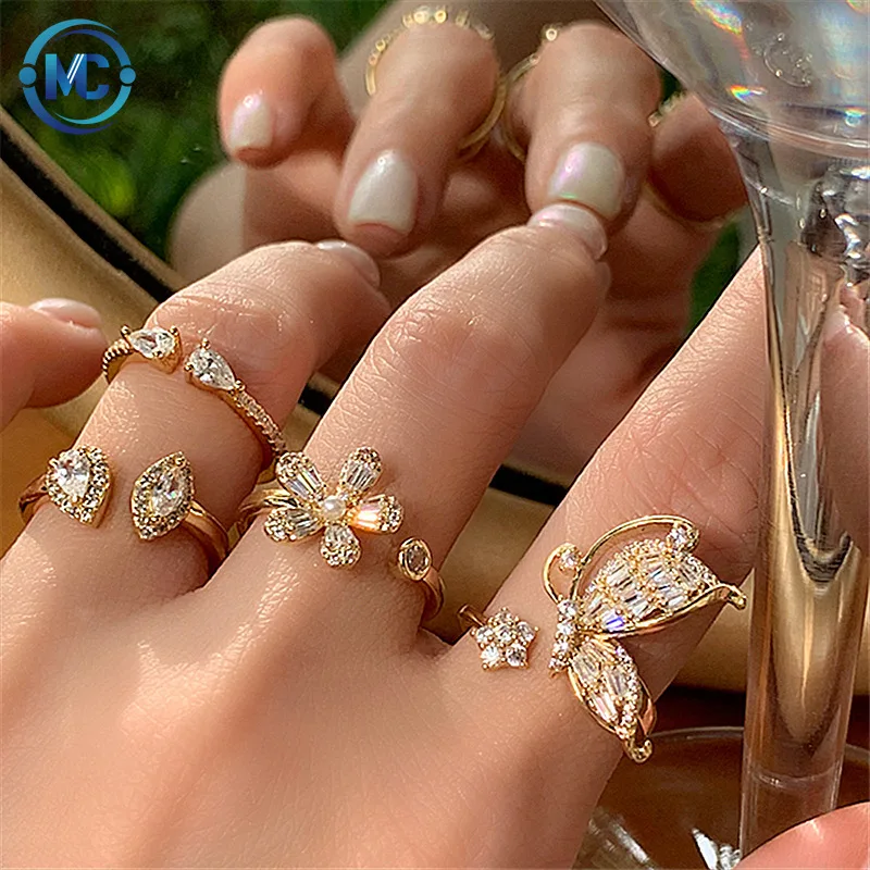 

Wholesale Copper Zircon Fashion Butterfly Flower  Crystal Rings Jewelry for Women, Gold