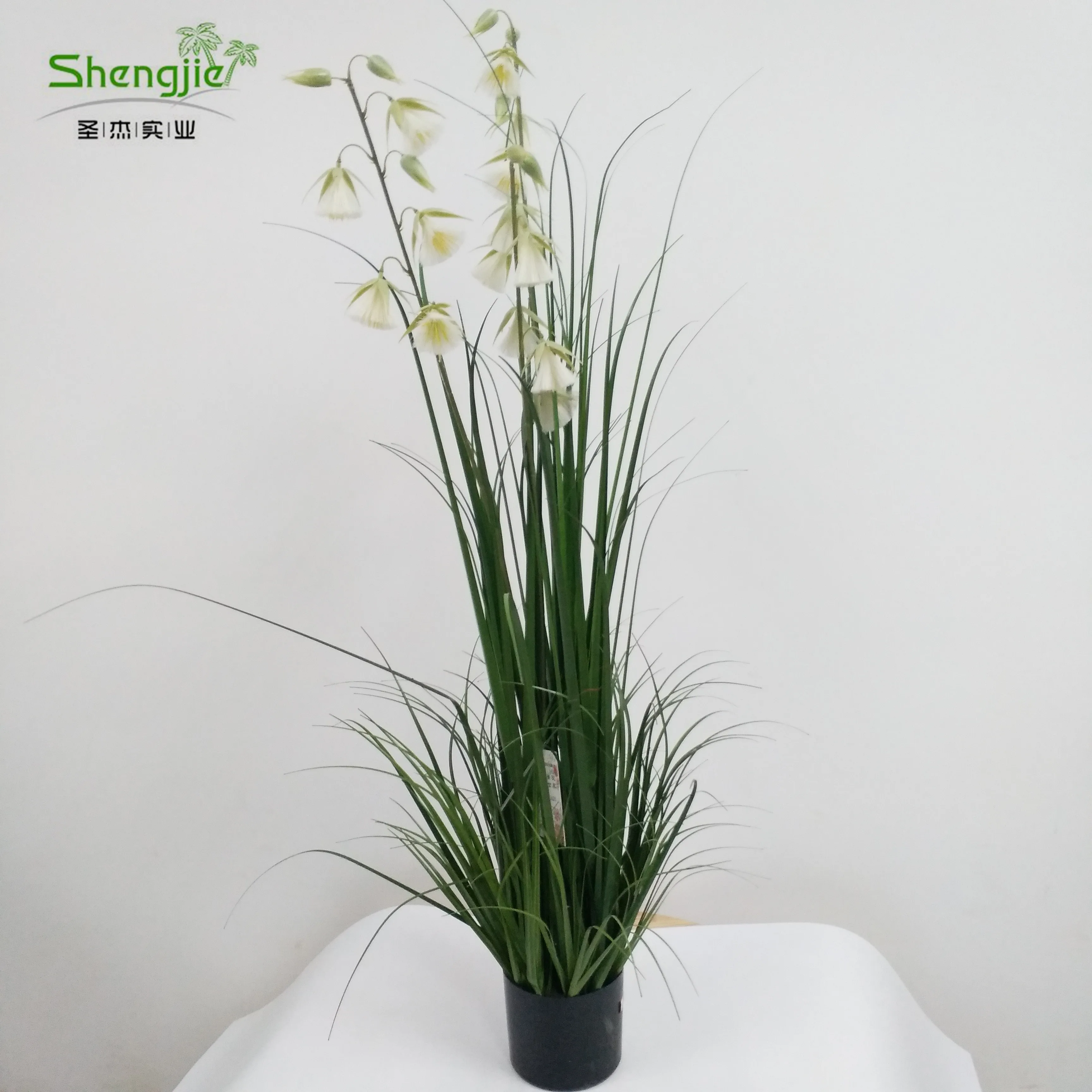 

artificial reed grass with white flower for decoration