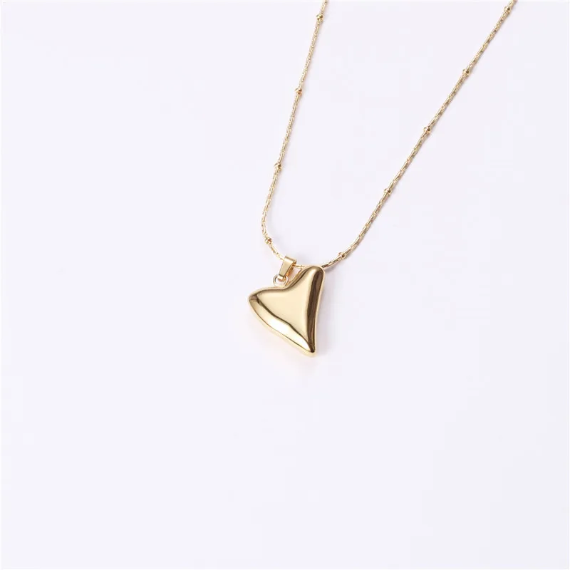 

Joolim Jewelry 18K Gold Plated Individuality Heart Pendant Sweater Necklace Stainless Steel Jewelry Wholesale