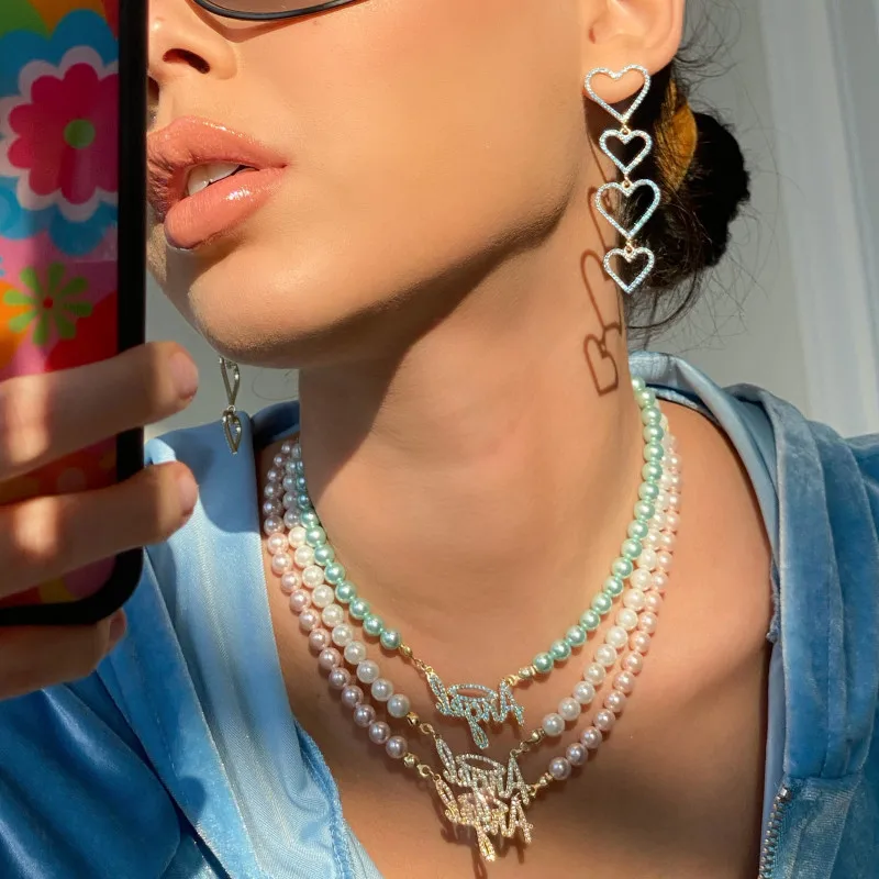 

Ins Trendy Elegant Freshwater Pearl Angel Pendant Necklace Titanium Steel Water Wave Chain Crystal Angel Necklace