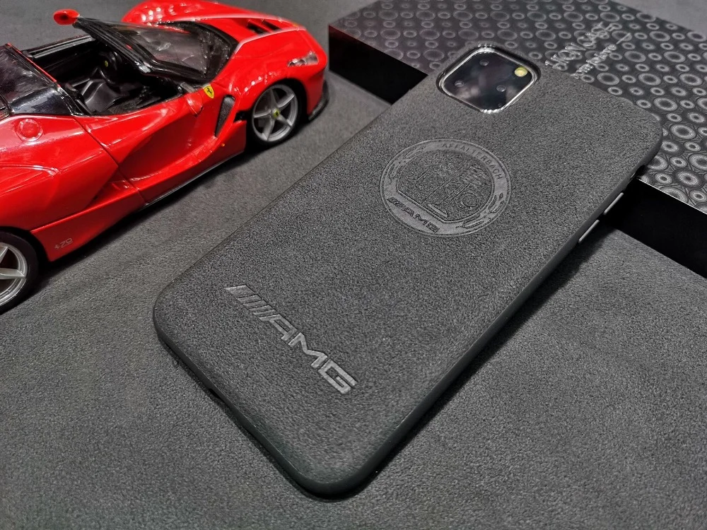 Custom most durable embossed Flipping Fur Suede car logo series mobile phone case plain mobile cover for iphone