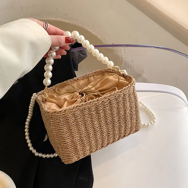 

2022 New Wholesale Fashion Drop Shipping Handbag Cross Shoulder Chain Small Jelly Basket Purses Woman Straw Beach Tote Bag