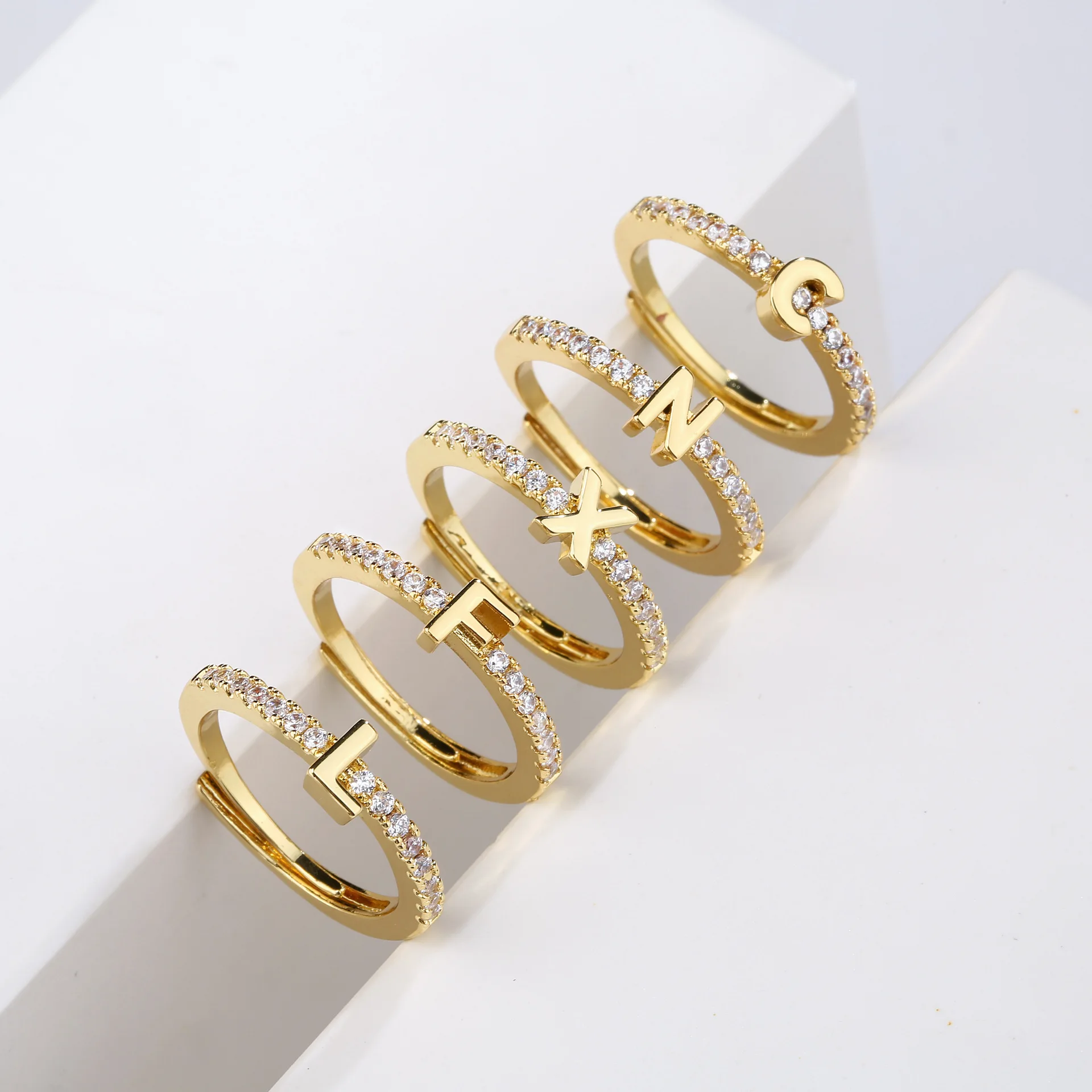 

Lateefah OEM Micro Pave CZ Zircon Stackable 26 Alphabet Initial Letter Ring