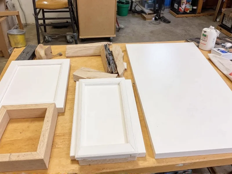 DIY cabinet refacing materials laid out on workbench