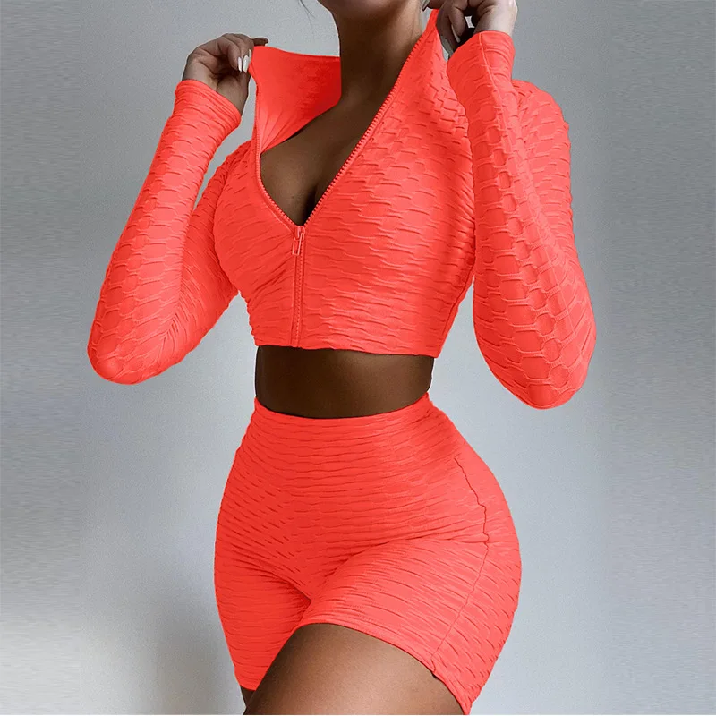 

2021 European and American women's yoga suit fitness solid color long sleeve casual sports suit