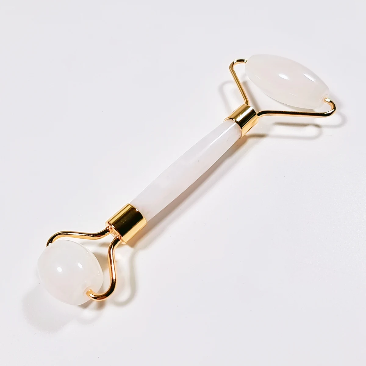 

Silicone handheld body massager slimming anti white jade massage roller