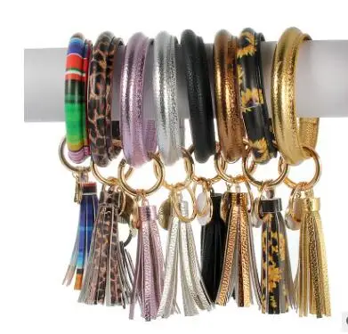 

PU Leather Circle Bracelet KeyChain Custom Circle Cute Same Color Tassel Wristlet Keychain Wholesale Women Girls Keyring