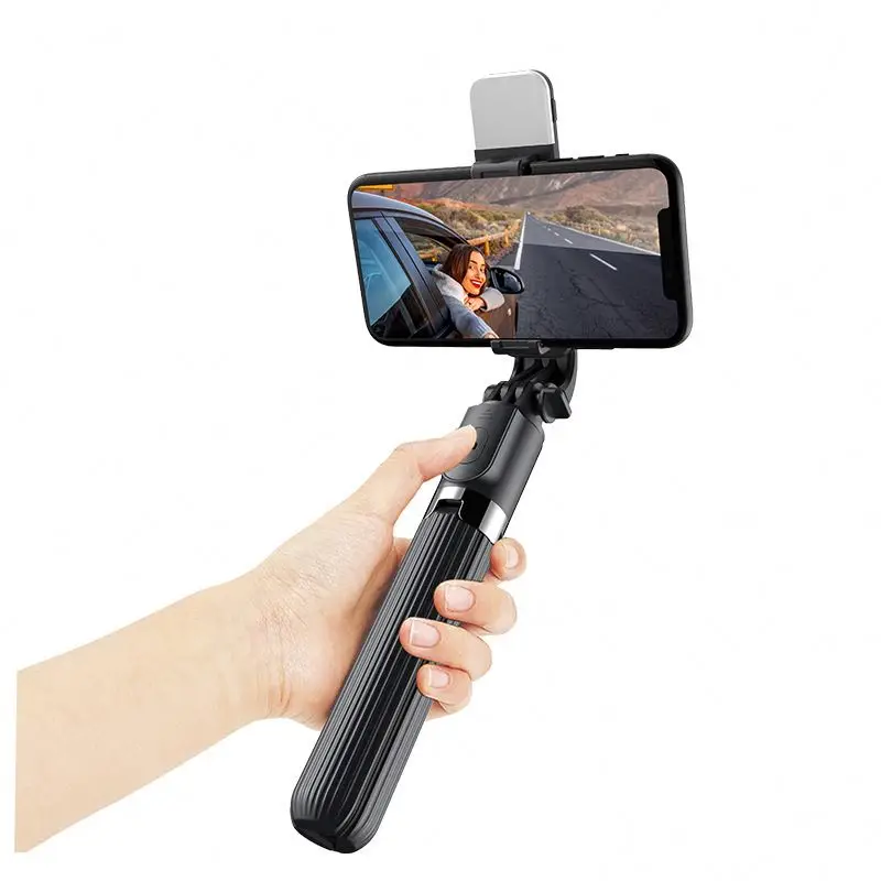 

Foldable telescopic selfie stick comes with a tripod and integrated stabilizer handheld selfie stick