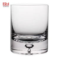 

old fashioned round heavy whiskey glass cup with chilling stones