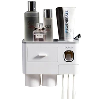 

2019 PP Plastic Wall-mounted Toothbrush Holder Automatic Toothpaste Dispenser unique Toothbrush Holder Suit