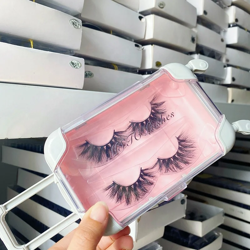 

Luxury fluffy 3d false mink eyelash bulk vendor wholesale pink custom lash boxes suitcase packaging