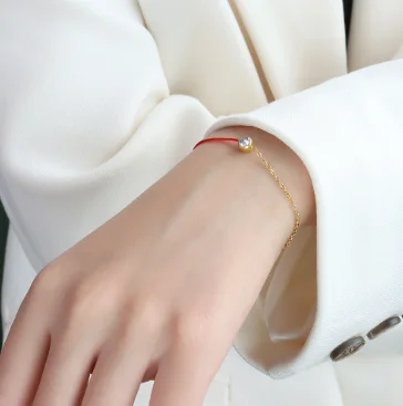 

Elegant Female Fashion Single Zircon Titanium Steel 18K Gold Plated Red String Rope Lucky Bracelet, Picture