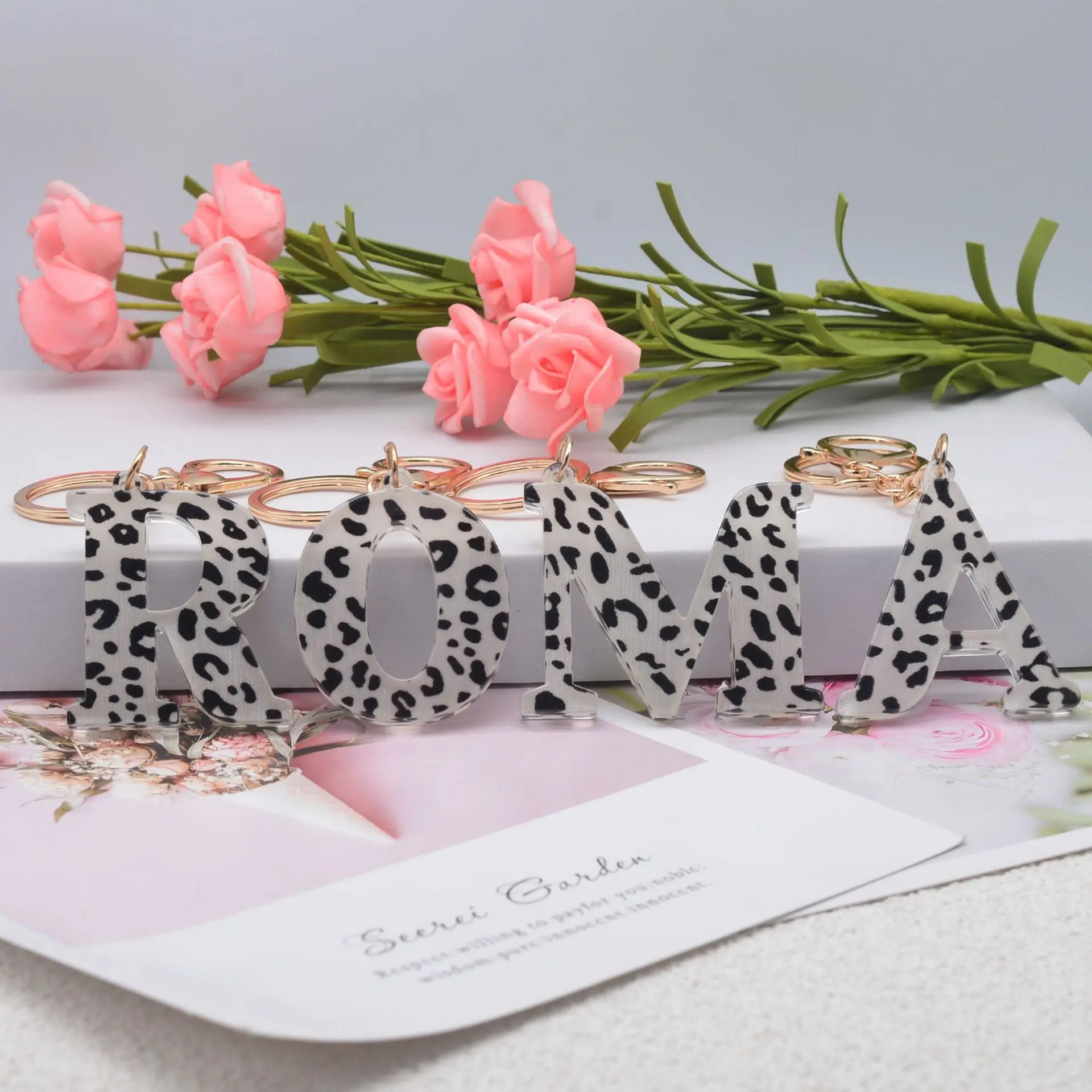 

New acrylic black and white leopard print letter keychain 26 letters creative style jewelry pendant gift