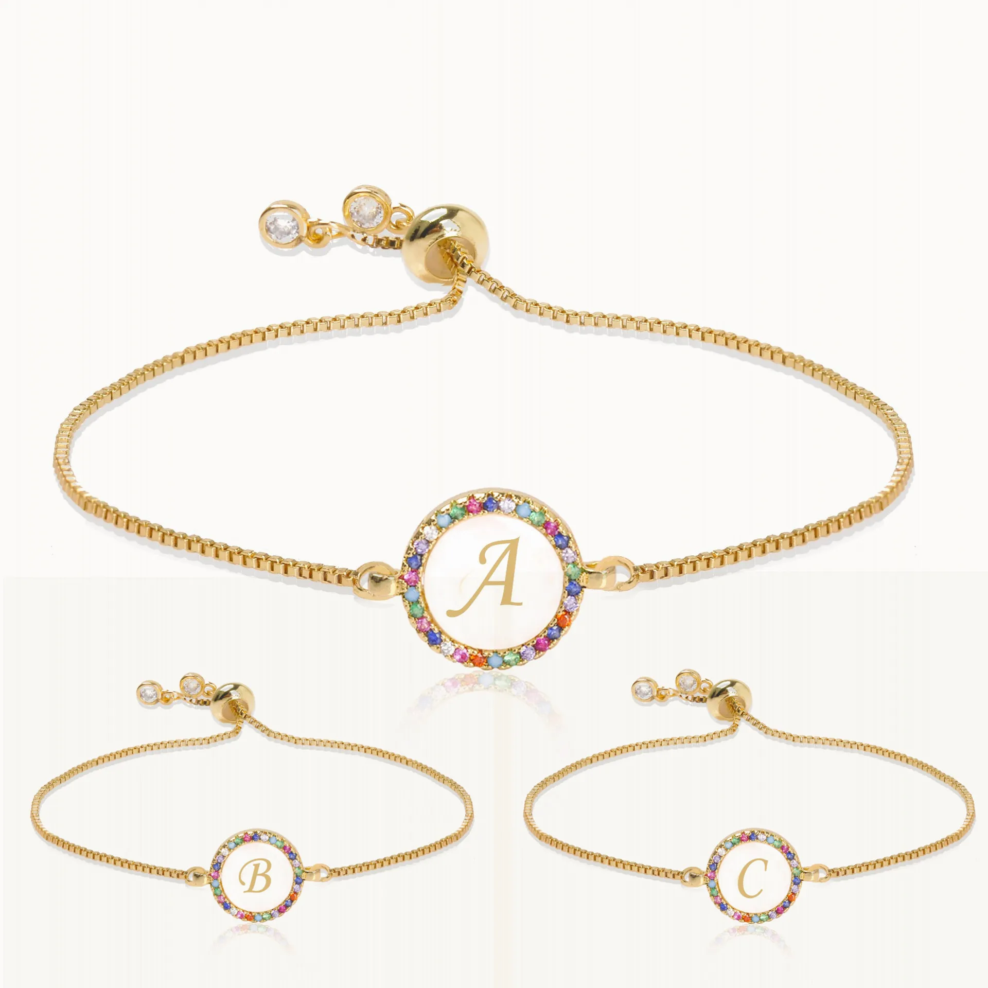 

Cross border 26 letter pull out shell bracelet round hand string peach heart color Zircon Bracelet, Custom color