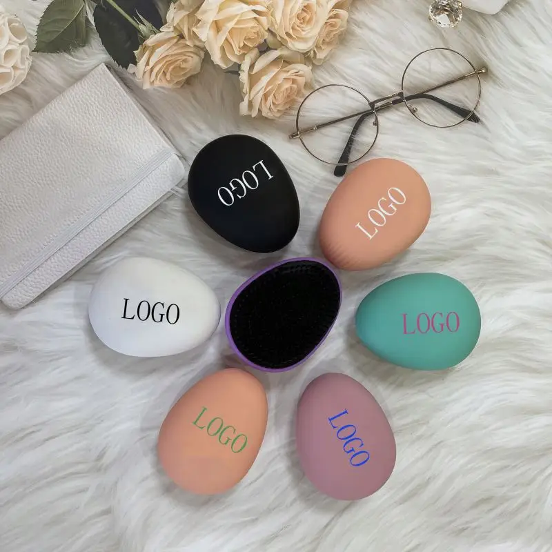 

Easy Ona Cap Custom Shapped Seashell Hairbrush Marble Shape Brushes Low Moq Pattern Black Matte Egg Private Logo Hair Brush