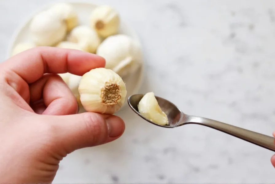 Visual comparison of garlic cloves to tablespoon measurement showing small medium and large cloves minced and measured