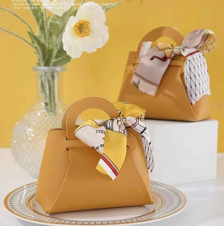 

Sweet Wholesale Small Pu Leather Wedding Candy Gift Box Candy Handbag for Baby Shower Birthday Party Wedding Favors