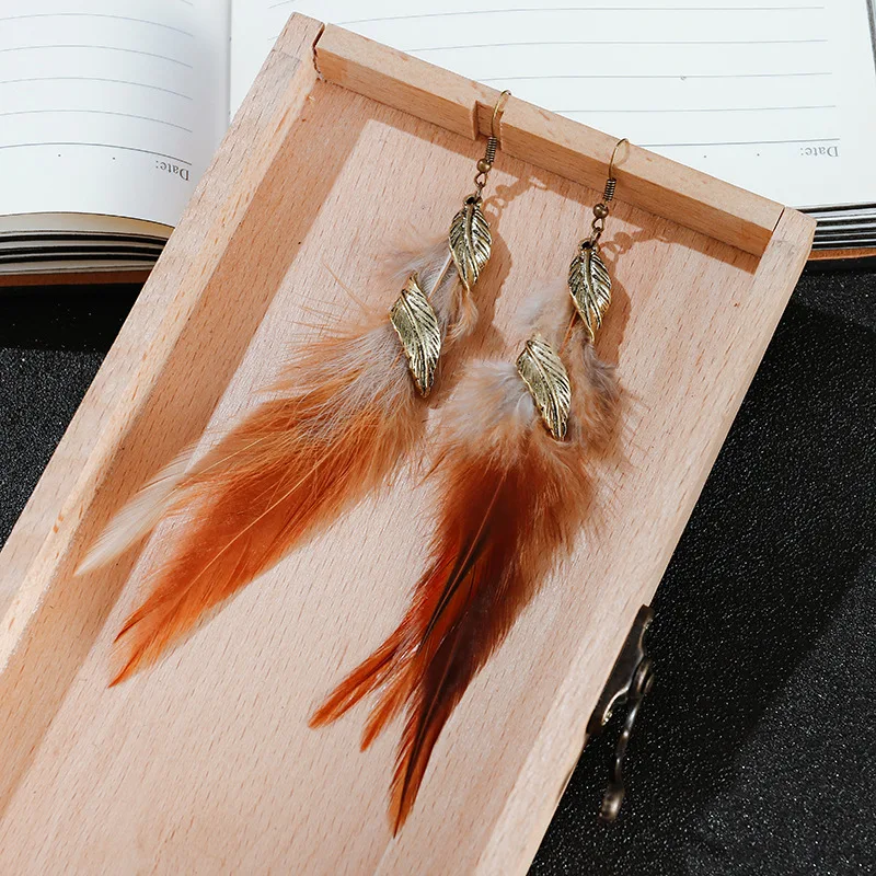 

Wholesale Bohemian Feather Leaves wild Women Earrings Jewelry