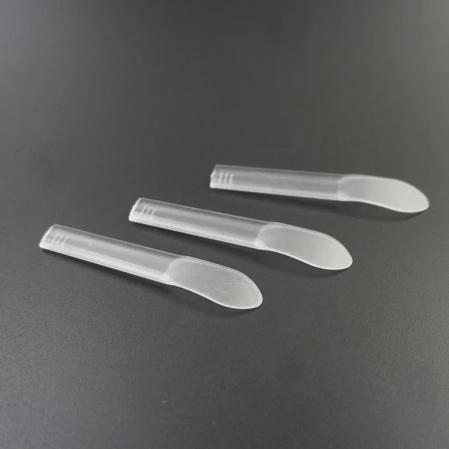 

Mini Cream Facial Cosmetic Spoon Plastic Professional Private Label Mental Makeup Cosmetic Spatula, Clear