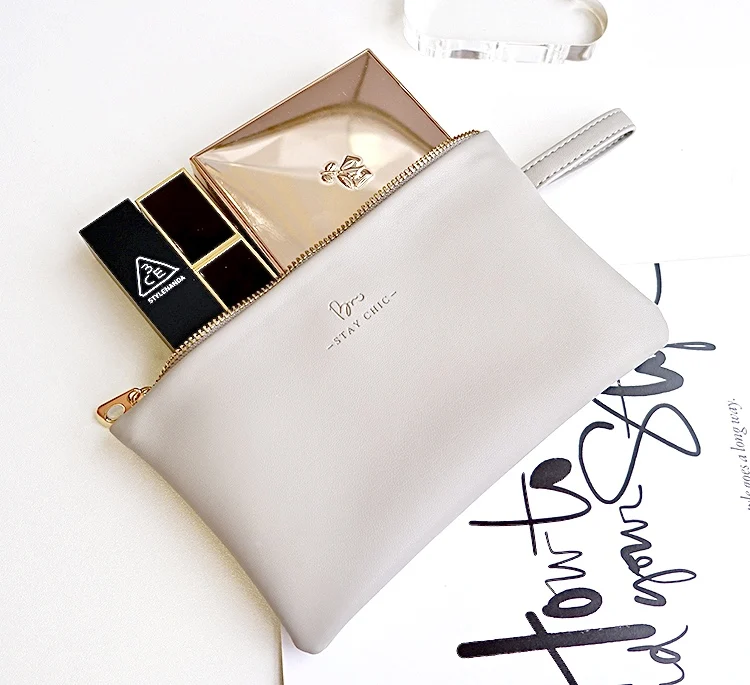 

BSCI factory fashion trendy flat envelope small size wrist loop cute makeup bag soft leather cosmetic bag, Customized