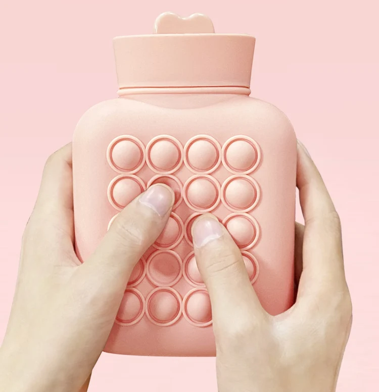 

Amazon's New Hot Water Bottle Keeps Warm Releases Pressure Silicone Sample Portable Fidget Hand Warmer