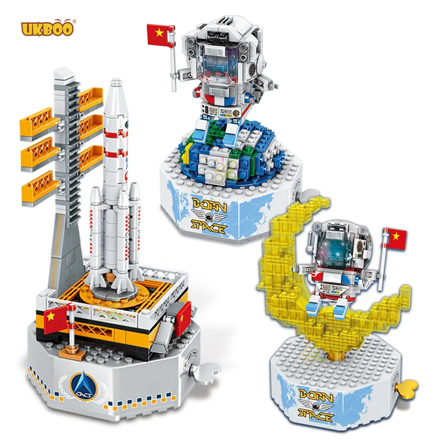 

Free Shipping UKBOO Earth Lunar Astronaut Carrier Rocket Rotating Music Box Building Blocks Boys DIY Space Exploration Bricks To