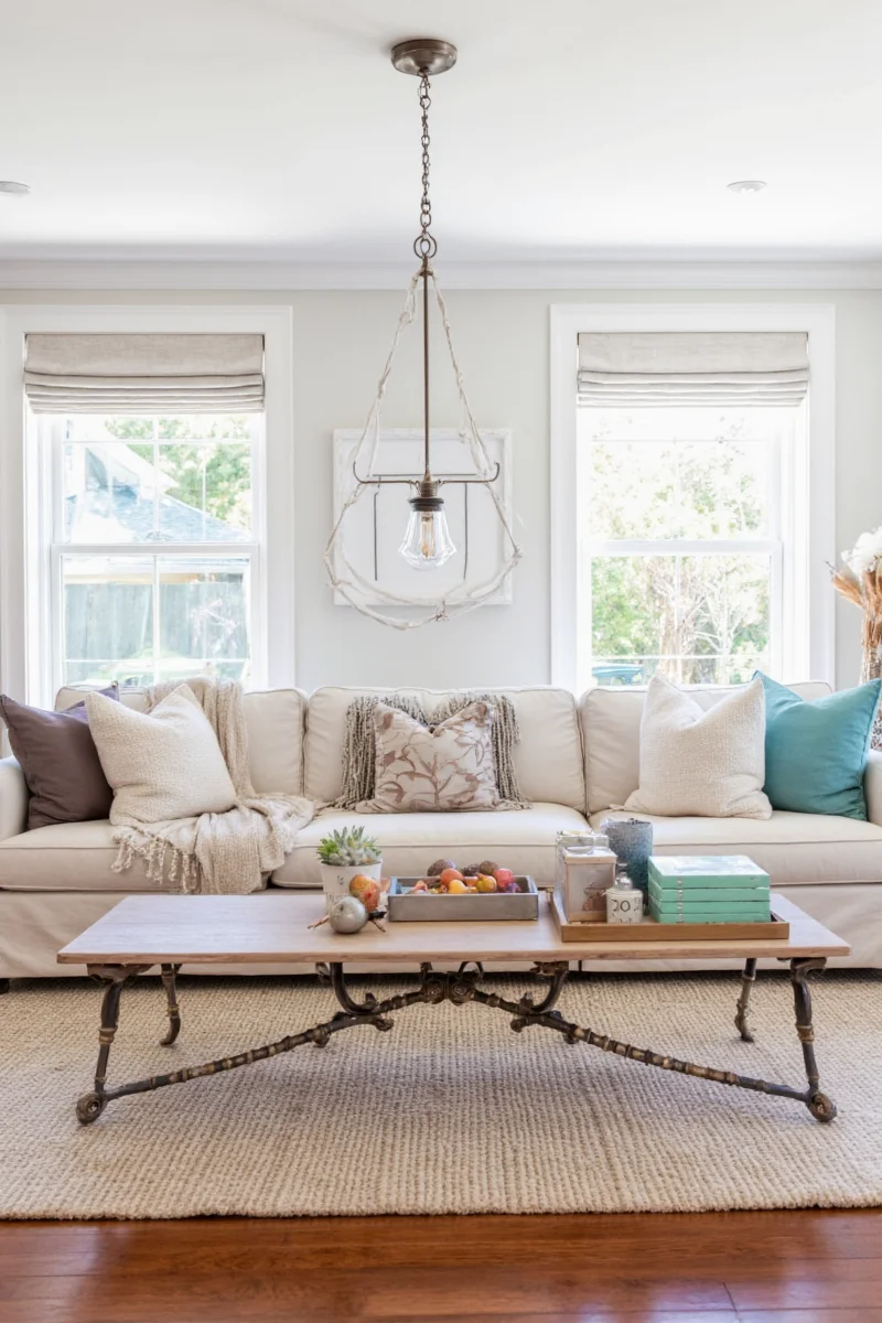 Styling sofa table with books and trays