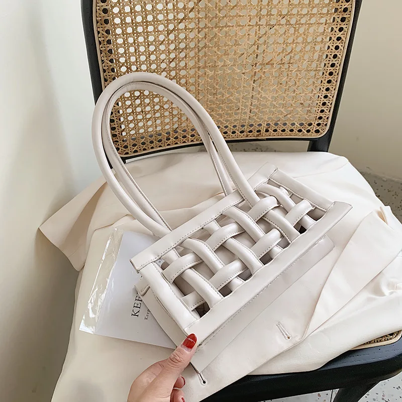 

Wholesale 2021 New Women INS Style Solid Color Casual Hollow out Knitted Underarm Bag Shoulder Handbag, Custom