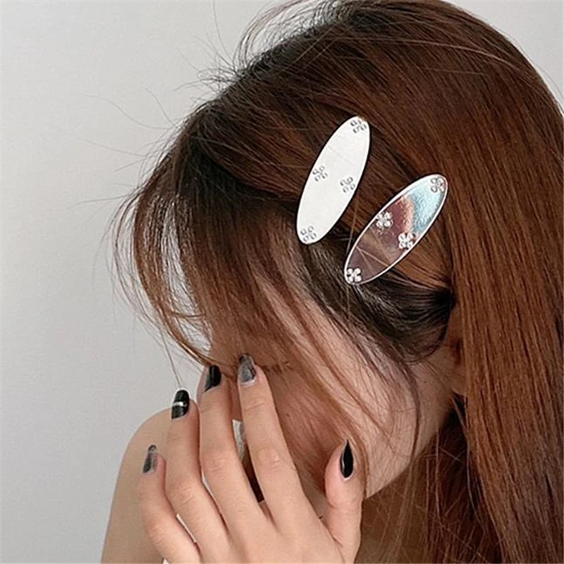 

Korean version of the senior sense pearl flower side hairpin metal geometric oval hair claw clips headdress
