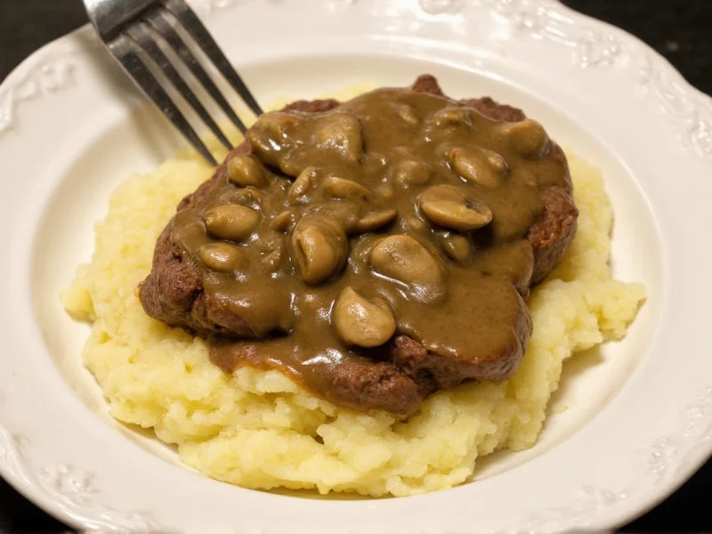 Homemade Salisbury steak with mushroom gravy on mashed potatoes
