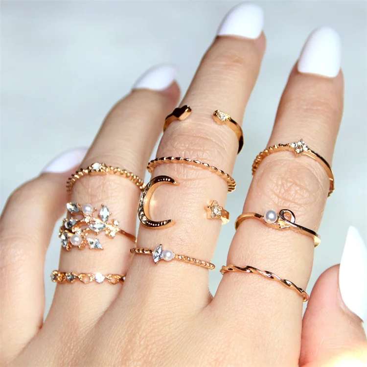 

Wholesale New 10 Pcs/set Bohemian Fashion Gold Plated Star Moon Love Leaf Rhinestone Pearl Women Ring Set