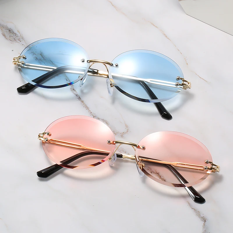 

New Rimless Metal Oval Retro Fashion Women Sunglasses