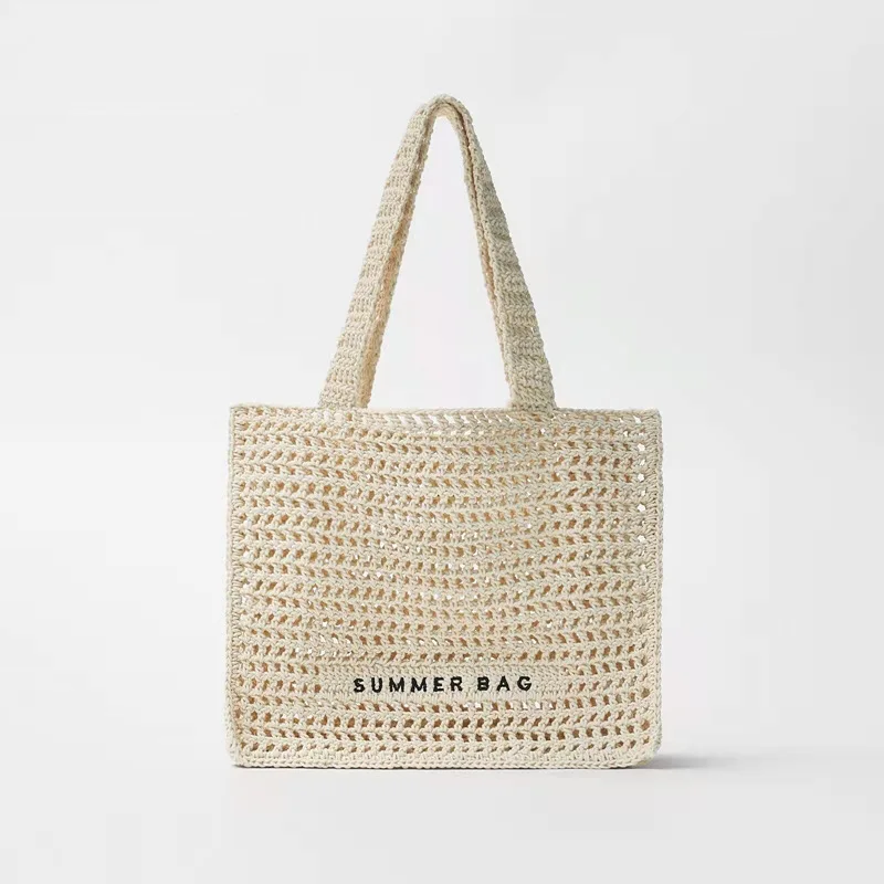 

New women shoulder bag Children's bag Hollow out Crochet woven handbag Summer beach letter embroidery straw woven bag