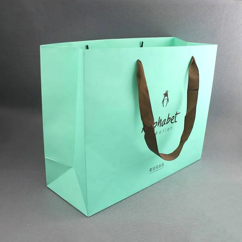 

Professional Customize Blue Paper Shopping Bags Manufacturers, Cmyk or pantone colors